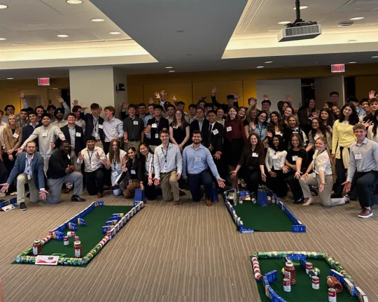 Indoor golf team-building event